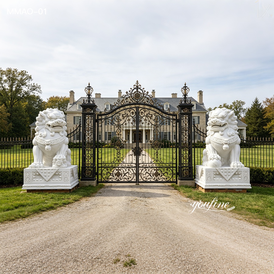 Pair of white marble Chinese foo dog statues at luxury villa entrance, large hand carved stone guardian lion sculptures for driveway gate