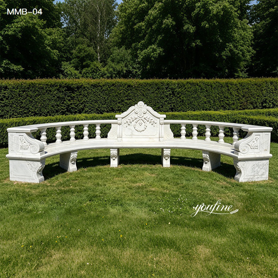 Elegant white marble garden bench with curved backrest, relief carvings, and column details