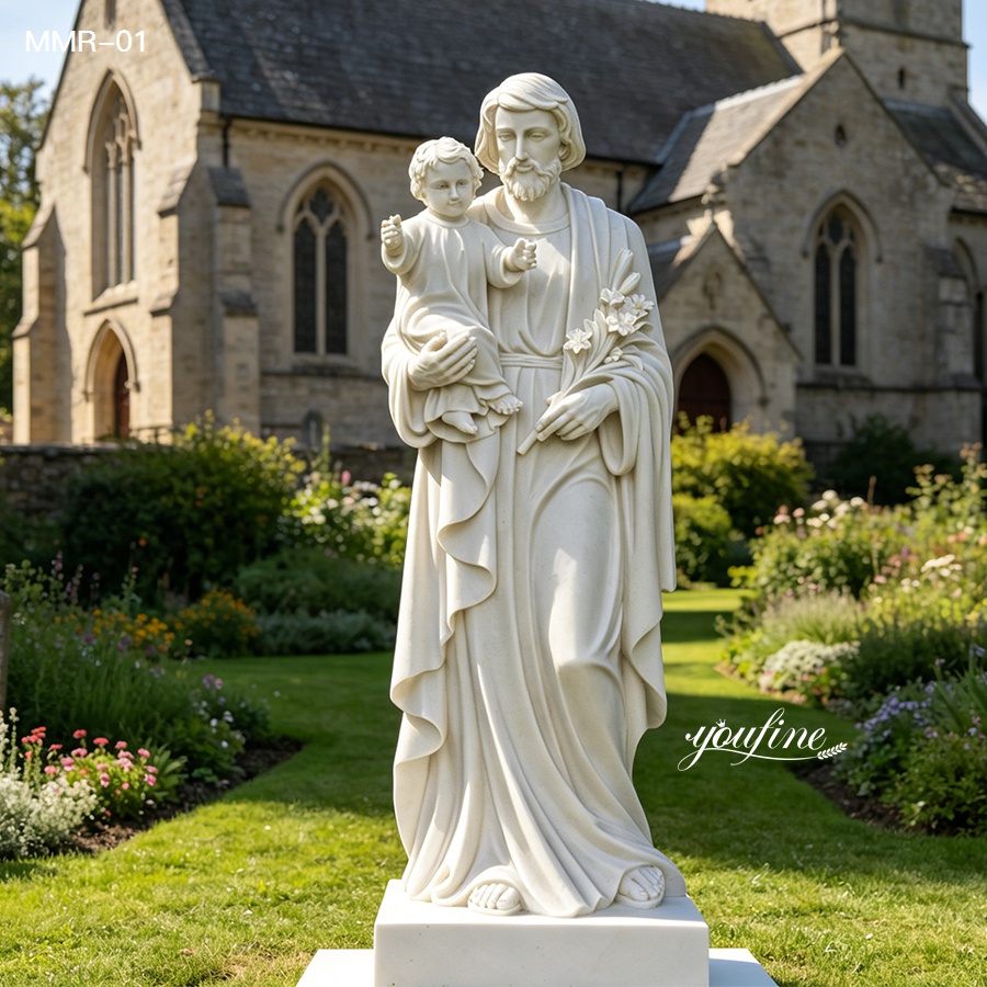 Hand-carved white marble St Joseph statue holding baby Jesus, placed in a church garden, crafted by YouFine.