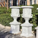 a pair of Large marble plant pot