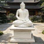 Marble Buddha statue on stone pedestal, classic design for temple courtyard and large outdoor spaces