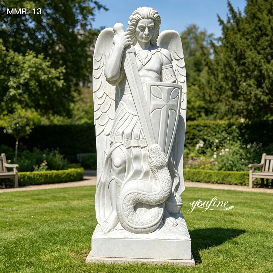 Pure white marble St Michael the Archangel statue, depicting the archangel slaying Satan in a garden setting