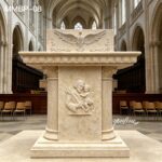 Handmade beige marble pulpit with Holy Spirit dove relief and saint sculpture, classic church lectern