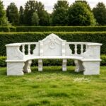 hand-carved white marble bench with decorative relief design for garden or courtyard decor