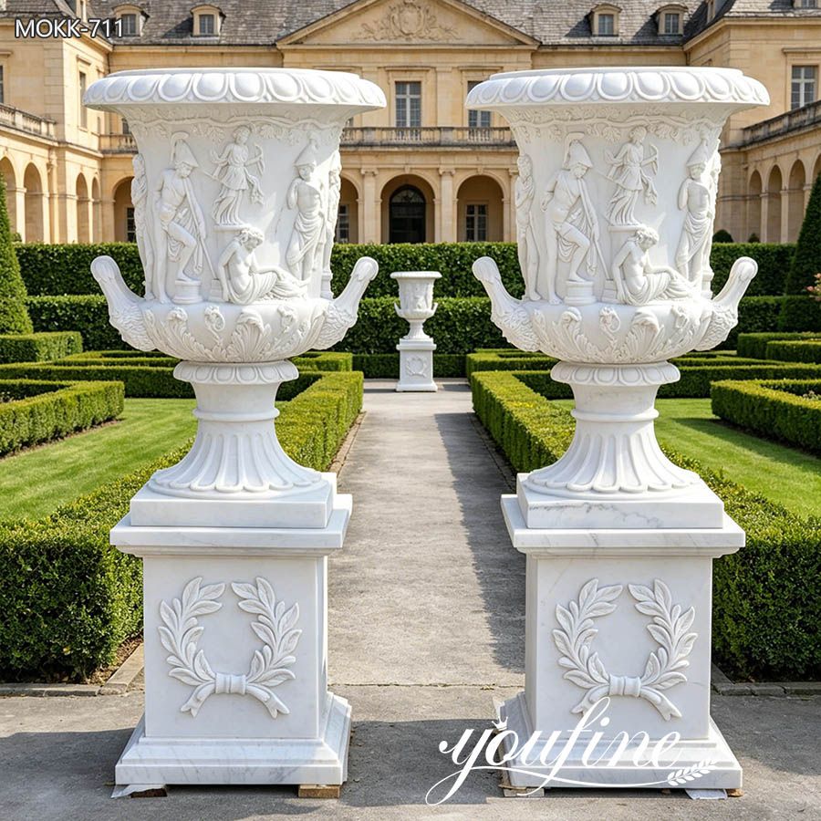 Large marble plant pot front building