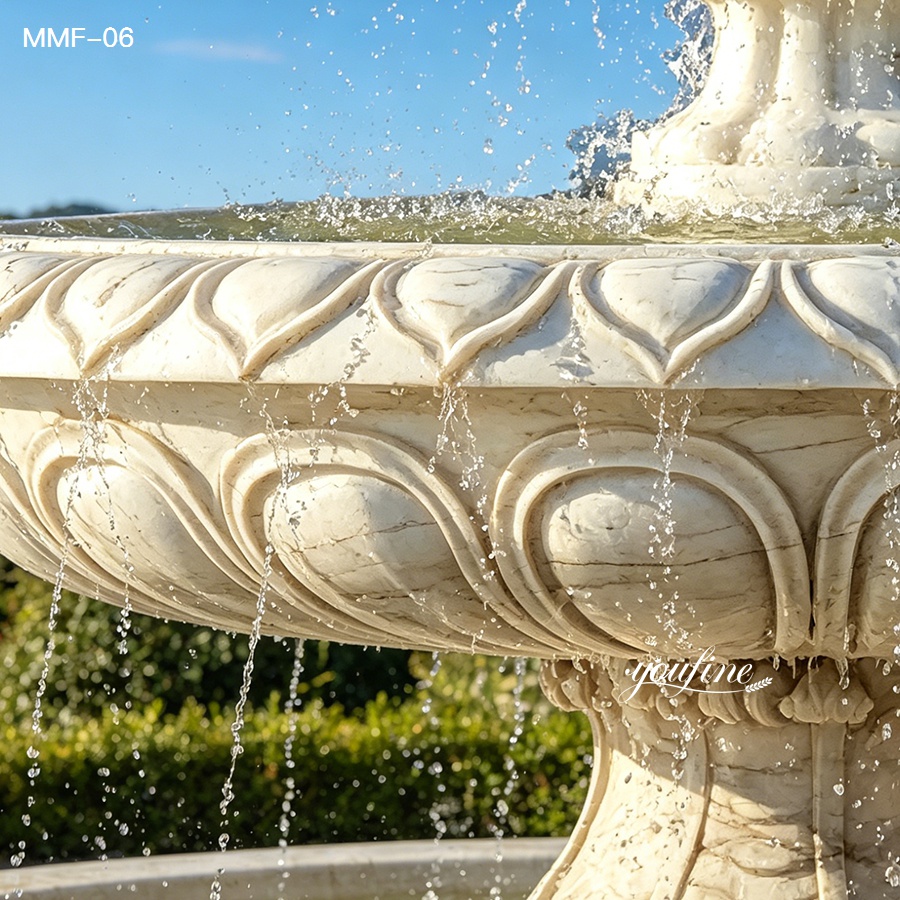 upper bowl carving detail of one tier marble fountain