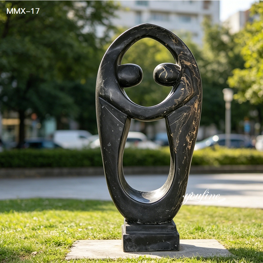 Abstract embracing couple black marble sculpture, contemporary outdoor art for garden