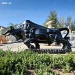 High-gloss black marble bull statue with detailed muscle definition