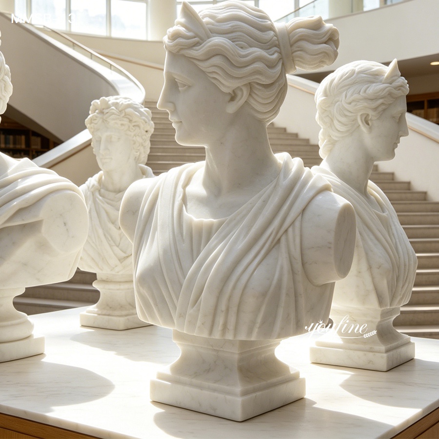 Group view of hand-carved marble bust of Diana the Huntress, multiple statues in gallery setting