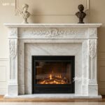White Carrara marble fireplace surround with classic carvings, bust sculptures on the mantel, lit fire