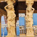 hand-carved caryatid female figures used as decorative gazebo columns