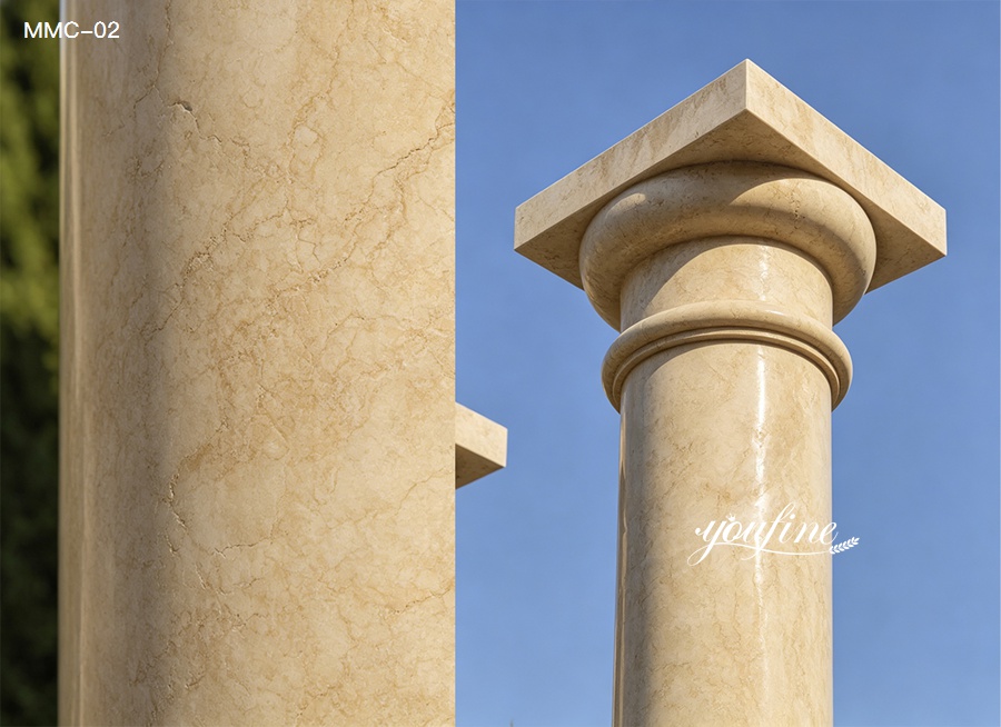 Close-up shot of marble pillars for sale, highlighting the tapered column capital and natural stone vein details of the beige marble