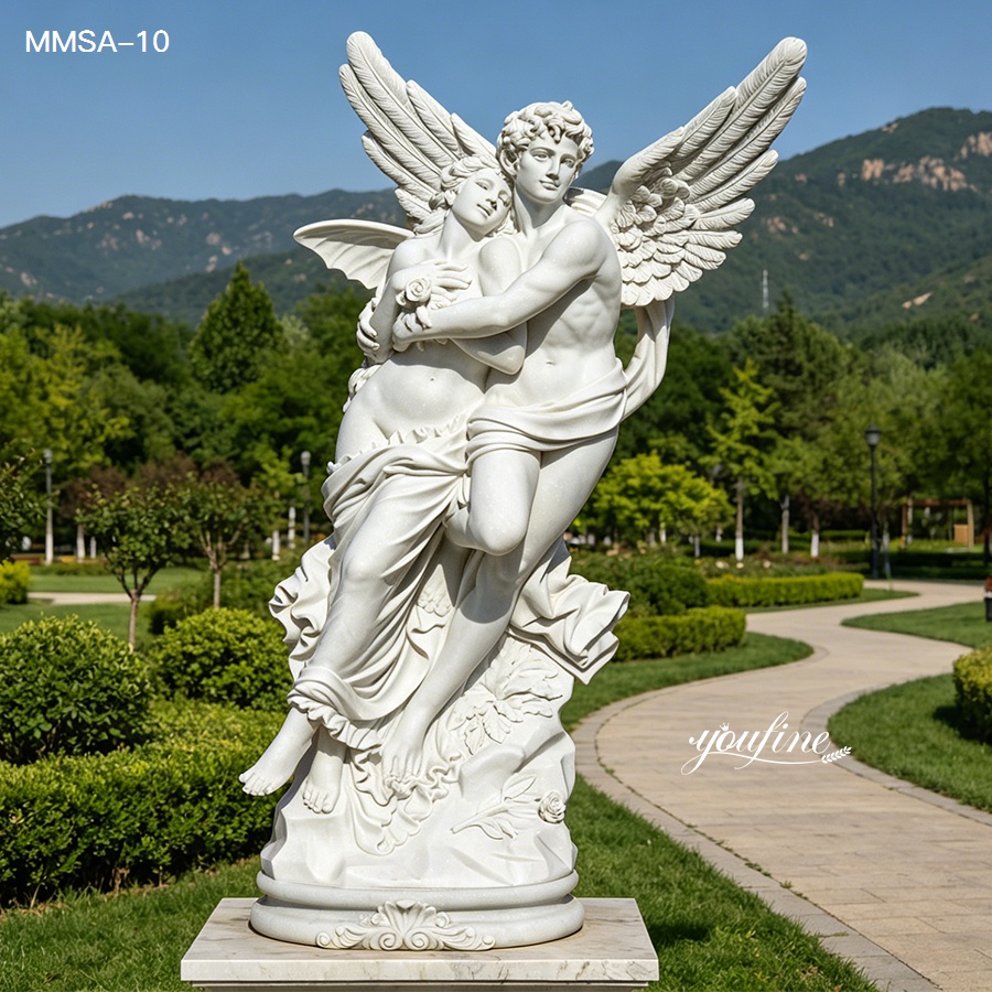 Cupid and psyche marble sculpture installed in a landscaped garden
