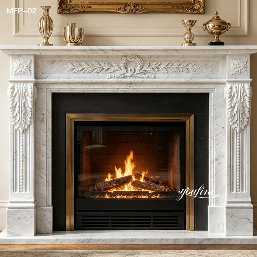 Elegant white Carrara marble fireplace surround with detailed carvings and gold-trimmed firebox, lit fire