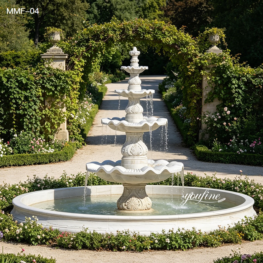 Four-Tier Marble Fountain in a Garden Surrounded by Flowers