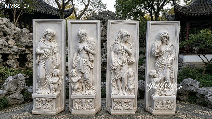 Set of four classical marble relief sculptures depicting goddesses, wall-mounted garden art