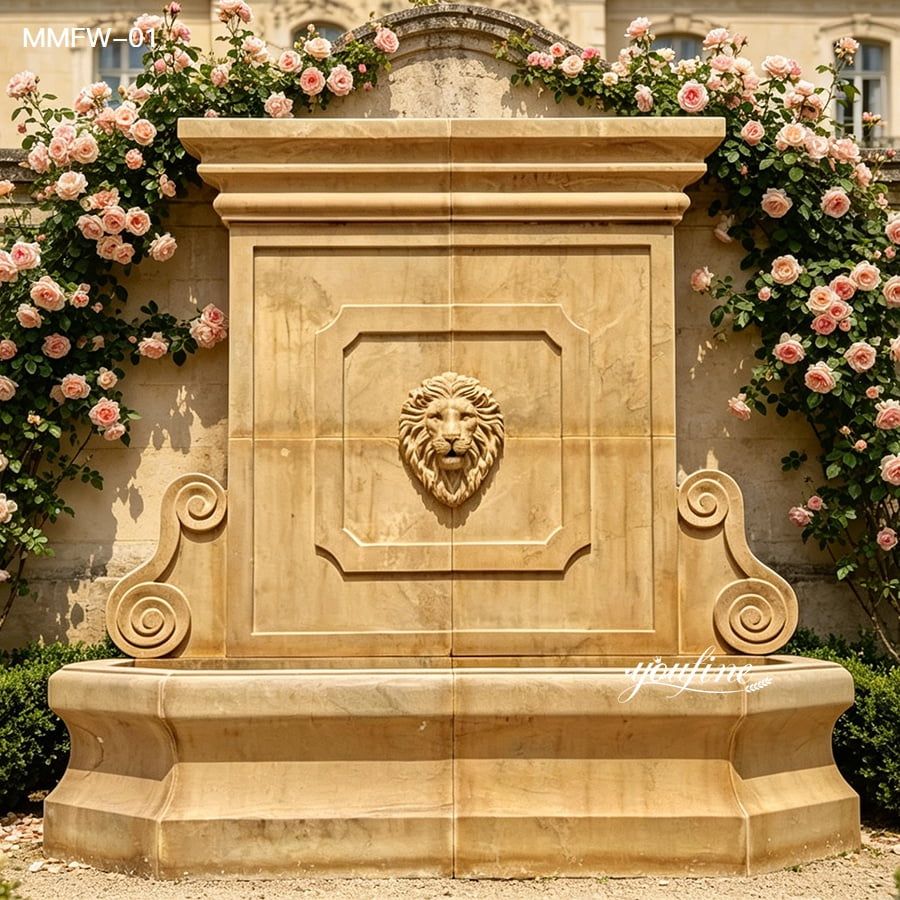 Hand-carved stone wall fountain with scroll details in front of climbing roses