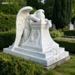 hand carved marble angel memorial tombstone with detailed wing and pedestal patterns