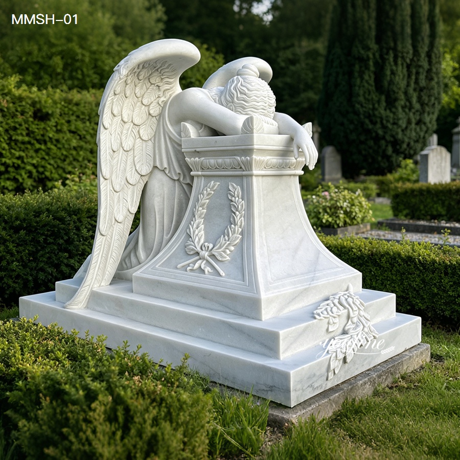 hand carved marble angel memorial tombstone with detailed wing and pedestal patterns