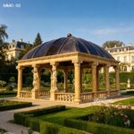 luxury marble gazebo with classical columns in landscaped garden
