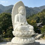 hand carved marble buddha statue on lotus base, traditional temple background, peaceful design