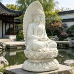 marble buddha statue with backlight, zen garden setting, pond and stone decor, calm atmosphere