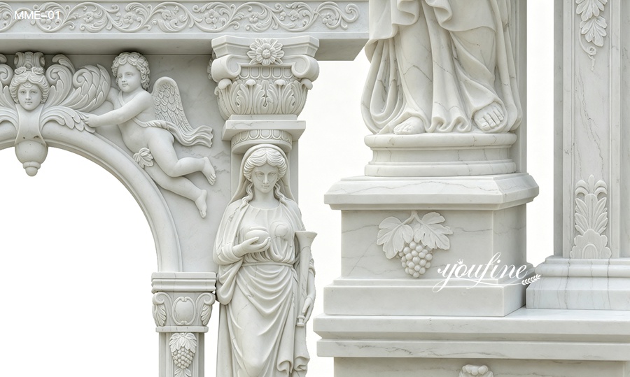 Close-up of hand carved white marble door frame with angel and lady statue carvings