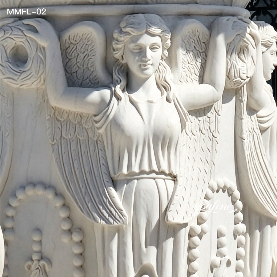 Detailed marble figure carving on the central pillar of an outdoor lion water fountain.