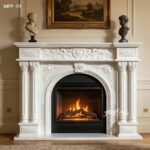 Hand-carved white marble fireplace surround with floral reliefs
