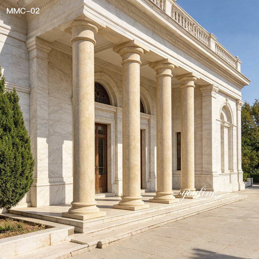 Polished cream marble pillars for sale, custom size tapered columns lining the entrance of a grand commercial building