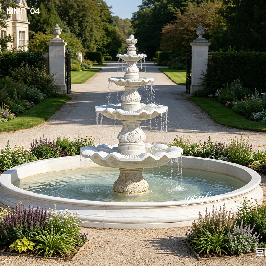 Four-Tier Marble Fountain with Water Flowing in a Scenic Garden
