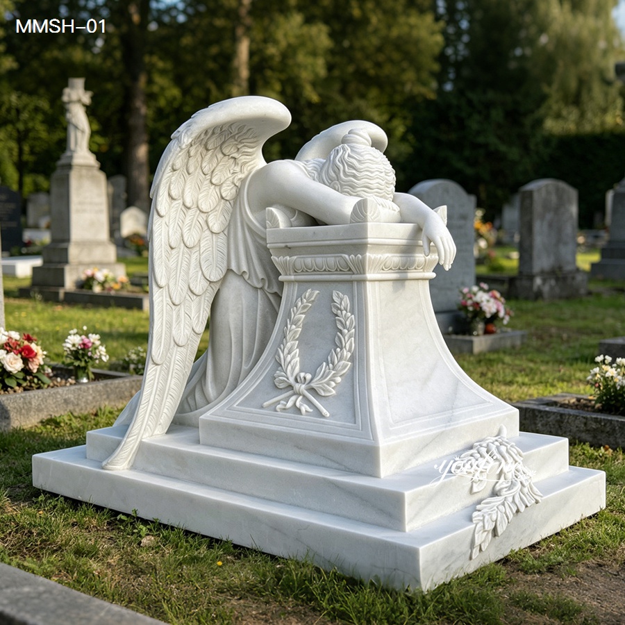 Life size white marble weeping angel memorial statue against green tree cemetery scenery