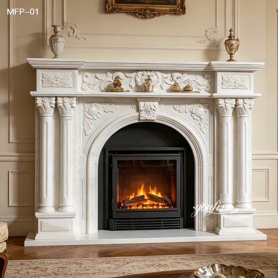 Ornate white carved marble fireplace surround with classical details
