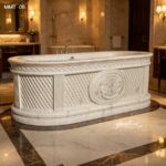 Hand carved marble bathtub with crest relief & lattice carving, freestanding white marble tub in classic luxury bathroom