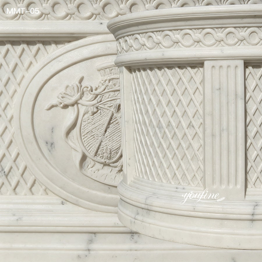 Close up view of hand carved emblem relief & lattice texture on solid white marble bathtub exterior