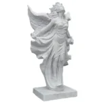 A white marble sculpture of an angel with flowing garments and detailed wings, showcasing expert craftsmanship.