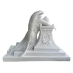 Elegant white marble sculpture of an angel mourning over a detailed pedestal with a laurel wreath design, expressing solemnity.