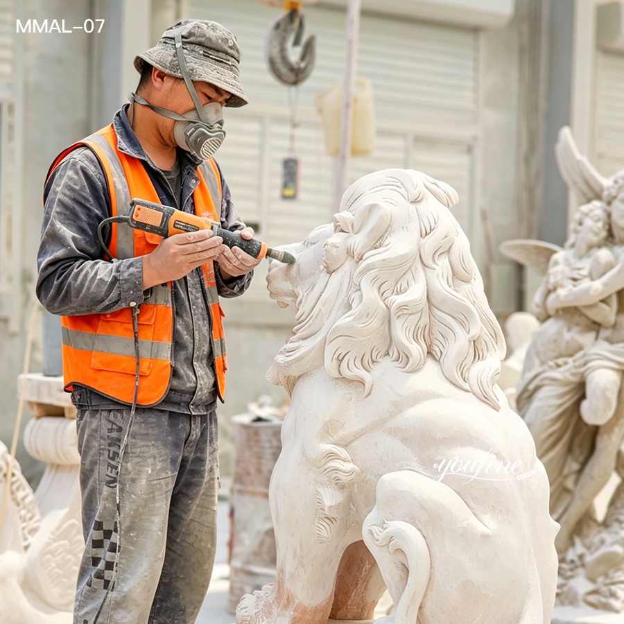 Skilled artisan wearing safety gear and an orange vest, carving a detailed marble lion sculpture in an outdoor workshop setting.