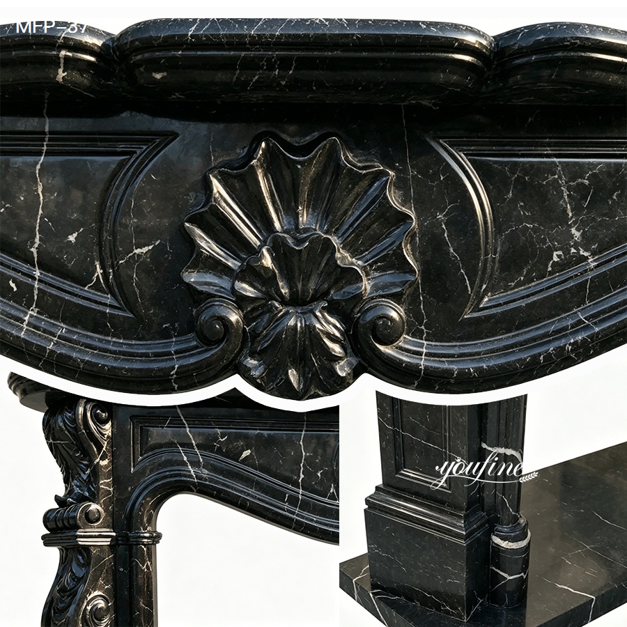 Close-up of intricate carvings on polished black marble featuring floral and curved patterns, highlighting fine craftsmanship.