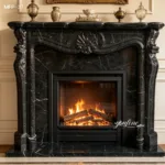 Luxurious black marble fireplace with ornate carvings and a glowing fire, complemented by decorative vases above.