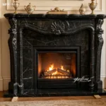Luxurious black marble fireplace surround with intricate carvings, housing a glowing fire. Classic decor accents on mantle.