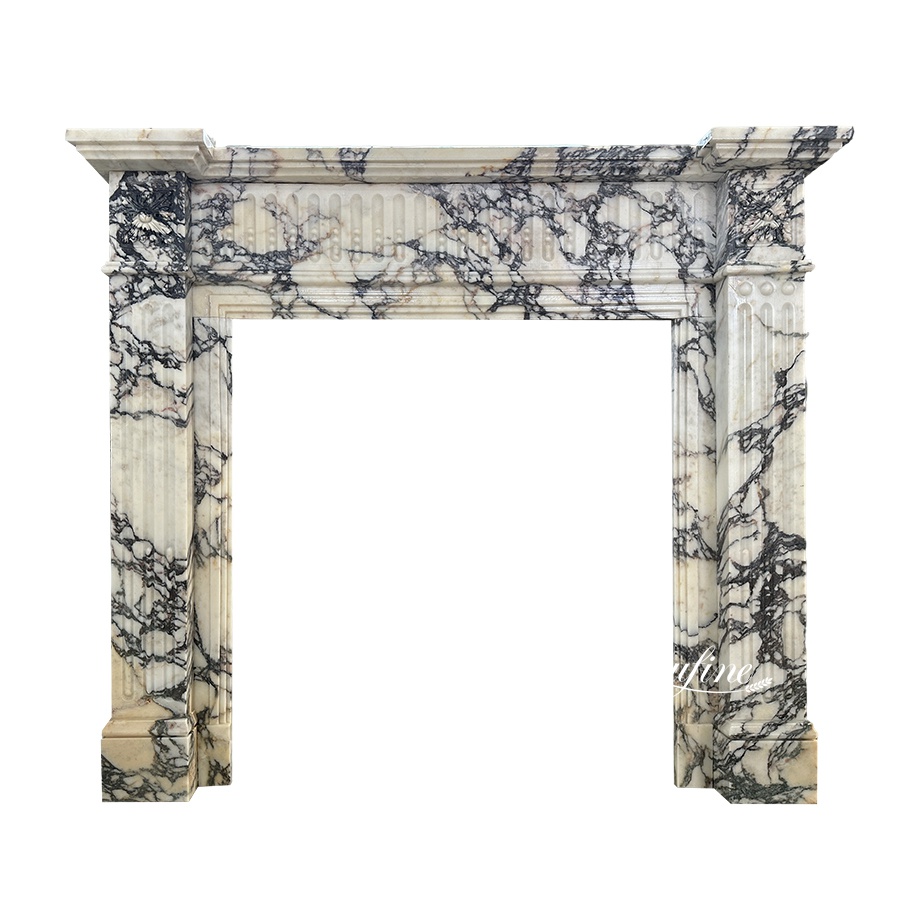 Sophisticated marble fireplace surround featuring intricate black veins, fluted columns, and a polished decorative frame.