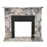 Elegant fireplace surround crafted from luxury black and white veined marble with intricate column designs and a sleek rectangular opening.
