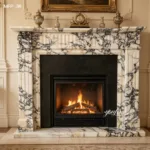 Elegant white marble fireplace with black veining, intricate details, and a glowing fire, complemented by vintage decor on mantel.