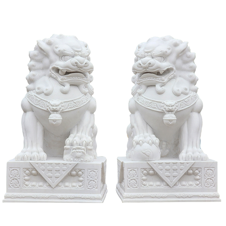 Pair of intricately carved white marble foo dog statues on ornate bases, symbolizing protection and prestige.