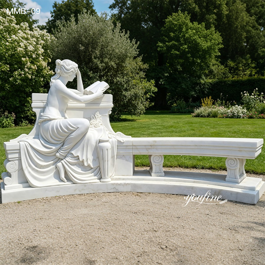 Intricate marble sculpture featuring a seated woman reading beside a decorative curved bench, set in a lush garden.