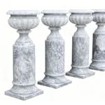 Four intricately carved marble pedestal columns with decorative details and polished surfaces, ideal for high-end decorative needs.
