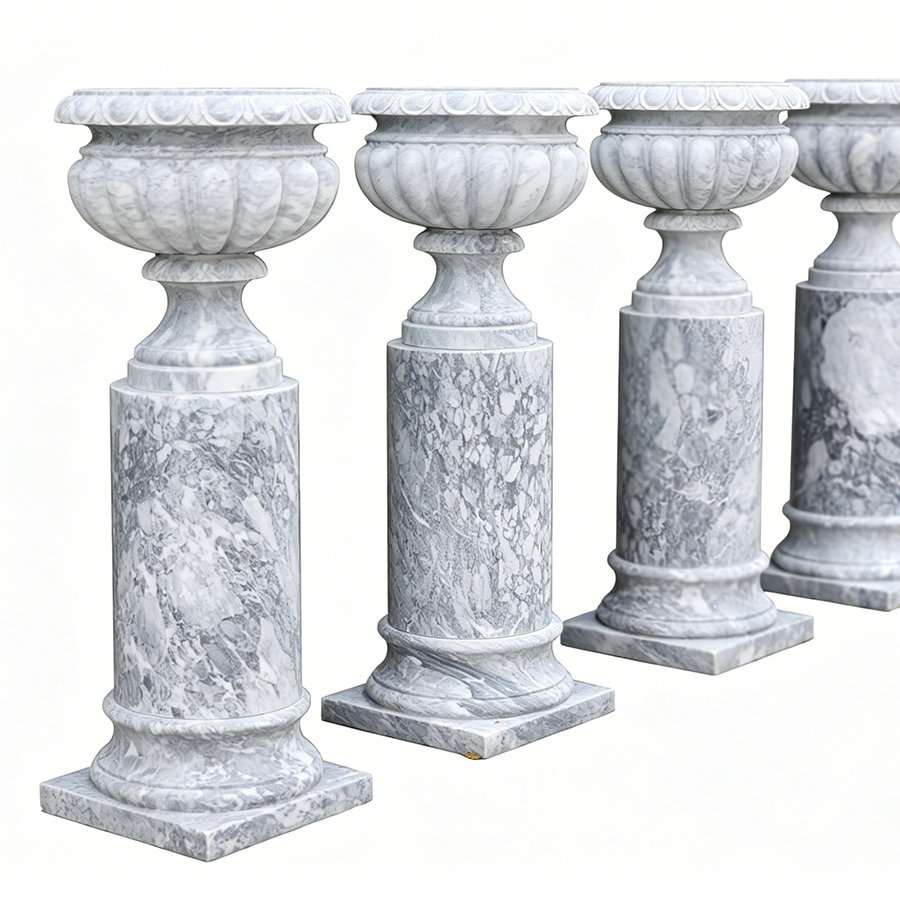 Four intricately carved marble pedestal columns with decorative details and polished surfaces, ideal for high-end decorative needs.