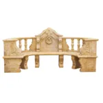 A luxurious curved marble bench with ornate carvings, decorative balusters, and a central floral motif, showcasing classical design.