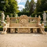 An intricately carved marble bench with mythological and ornamental details, displayed in an elegant garden surrounded by statues and hedges.
